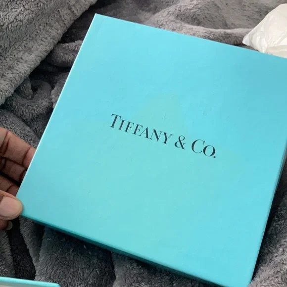 Tiffany & Co blue star porcelain jewelry box. Excellent condition..